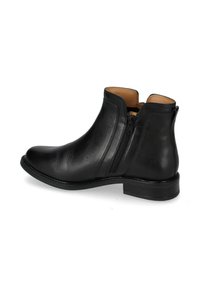 Stivale alla caviglia in pelle nera con una texture liscia, chiusura con zip sul lato, punta rotonda e tacco basso. Interno foderato in colore nocciola.