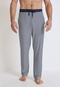 Streepjesslaapbroek in marineblauw en wit, met een elastische tailleband met een trekkoord en een losse pasvorm voor comfort.