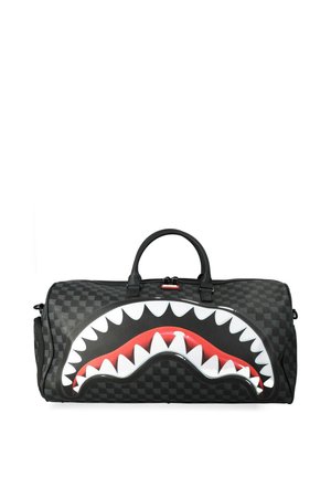 Borsa duffel nera a quadri con design bocca di squalo con denti bianchi e gengive rosse, e doppi manici sulla parte superiore.