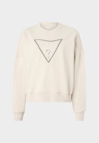 Felpa color crema con una toppa a forma di triangolo decorata con strass. Vestibilità ampia con polsini e orlo a coste.