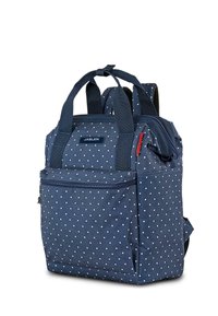 Mochila azul marino con lunares blancos, asas superiores, correas de hombro acolchadas, bolsillo frontal con cremallera y una etiqueta de tela con "JASLEN."