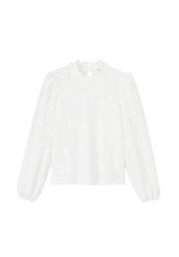 Blouse blanche à manches longues avec un motif floral texturé, encolure ronde et ouverture en forme de clé dans le dos. Manches légèrement bouffantes.