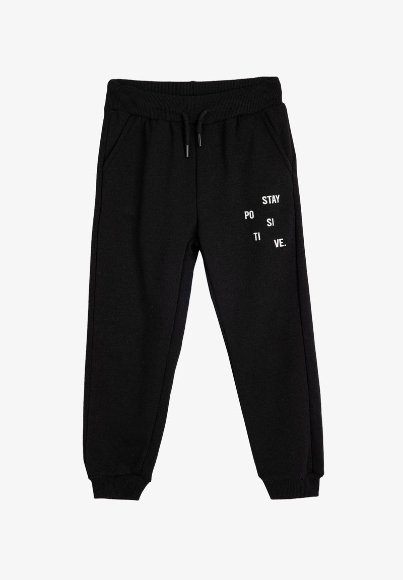 Black sweatpants made of soft fabric, featuring white text that reads "STAY POSITIVE" in various arrangements. Includes side pockets and cuffed ankles.