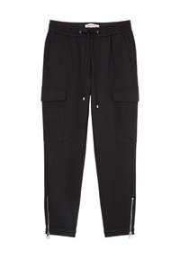 Zwarte joggingbroek van zacht materiaal, met een elastische tailleband, verstelbaar trekkoord, zijvakjes en ritsopeningen bij de enkels.