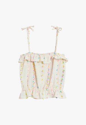 Baltas be rankovių trumpas palaidinė su raukiniais ir spalvotais siuvinėtais taškeliais, turinti plonas susirišamas petnešėles.