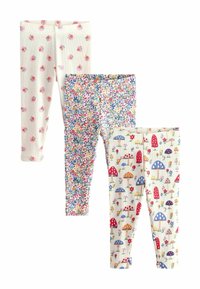 Tre paia di leggings: uno con fiori rosa su fondo crema, uno con stampa floreale colorata e un altro con funghi e fiori su uno sfondo chiaro.