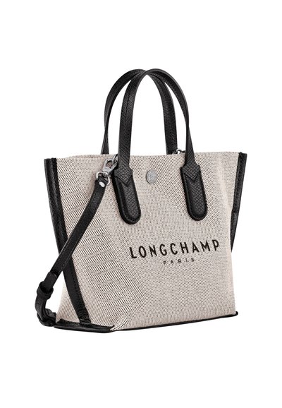Schwarze Leder- und Mesh-Tote-Bag mit Logo, ausgestattet mit zwei Griffen und einem abnehmbaren Schultergurt, strukturierte Form mit kontrastierenden Farben.