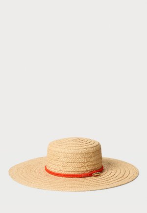 Vid brimsstråhatt med flat krone, med en teksturert naturlig farge og et oransje vevd bånd. Sirkulær form med en jevn finish.