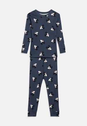 Tengerészkék pizsamaszett hosszú ujjú felsővel és nadrággal, melyeket ismétlődő Mickey egér arcképek és fehér kesztyűminták díszítenek. Puha pamut anyagból.