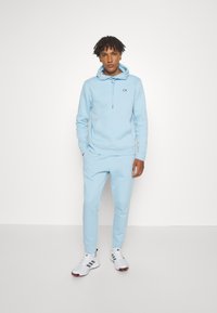 Calvin Klein Golf PLANET SPORTS SUIT - Trenirka - air blue