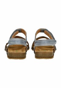 Šedé sandály s texturovaným svrškem, dvěma nastavovacími popruhy a hnědou tvarovanou podešví, které ukazují minimalistický design a funkční strukturu.