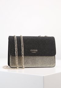 Guess Taška s příčným popruhem - gold-coloured
