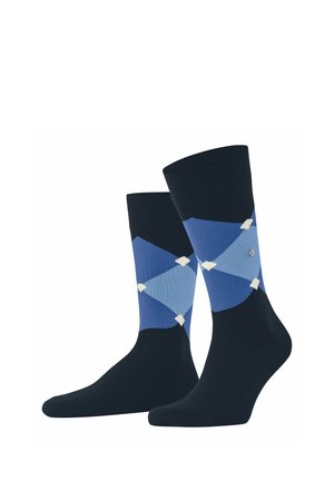 Par de calcetines azul oscuro con patrón de rombos argyle en azul claro y beige en la zona de la pantorrilla.