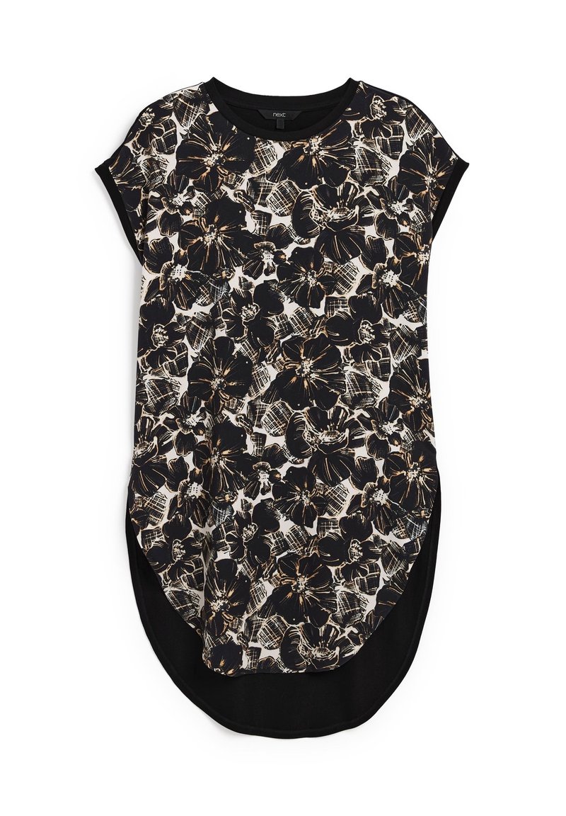 Vestido tipo camiseta con estampado floral en blanco y negro, cuello redondo, mangas cortas y dobladillo curvado. Fabricado en una tela suave con un ajuste holgado.