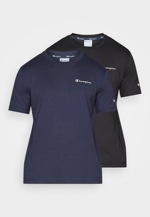 Two short-sleeve t-shirts, one dark navy and one black, featuring crew necks and small embroidered logos on the chest and sleeves.