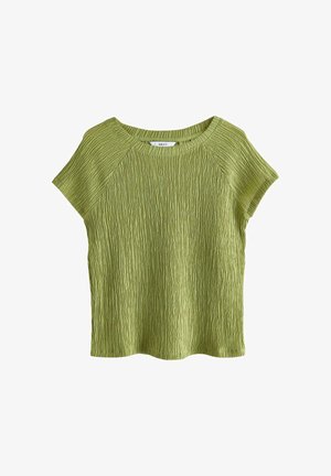 Haut à manches courtes, texturé, en vert clair avec une coupe légèrement ample. Présente un col rond et un motif à côtes verticales sur toute la surface.