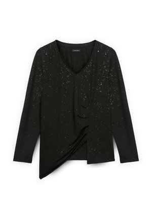 Schwarzes Langarmoberteil mit V-Ausschnitt, das an der Seite gerafft ist und verstreute metallische Punkte für Textur und visuelles Interesse aufweist.