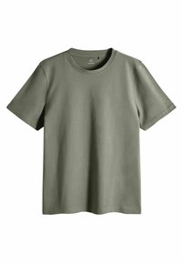 T-shirt corto in cotone di colore verde oliva, con maniche corte e colletto rotondo, con cuciture visibili su maniche e orlo, posato su uno sfondo bianco.
