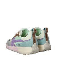 Sneakers with a light blue and lavender suede upper, white accents, and a chunky beige sole. Features a brown logo tab at the rear.
