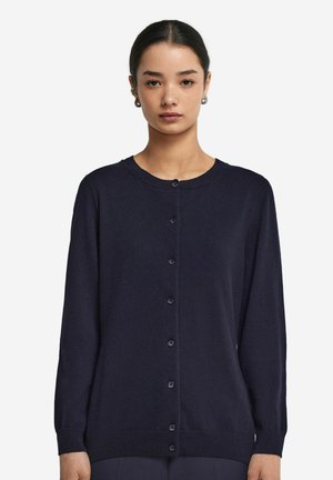 Marinblå cardigan i mjukt material, med rund hals, långa ärmar och knäppning fram med matchande knappar.