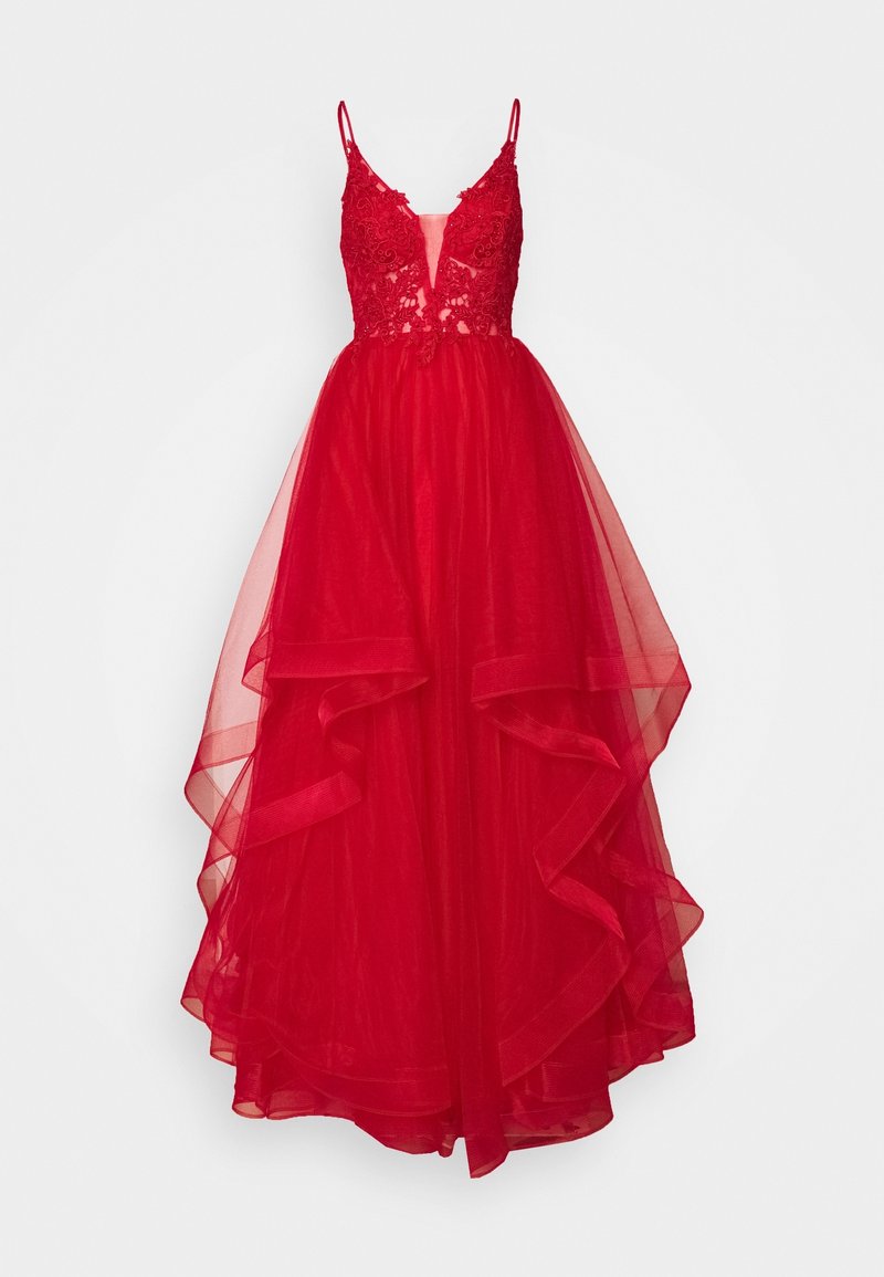 Robe rouge sans manches avec corsage en dentelle, décolleté en V profond, jupe en tulle superposée et ourlet en volants asymétriques.