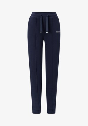 Pantalones deportivos azul marino hechos de tela suave con cintura ajustable con cordón, con detalles en la costura lateral y una etiqueta con logo en el frente.