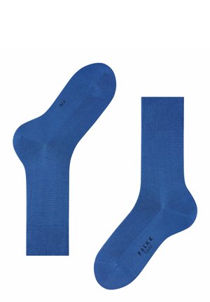 Blaue Baumwollsocken mit einer glatten Textur, verstärktem Fersen- und Zehenbereich sowie einem gerippten Bündchen für zusätzliche Haltbarkeit.
