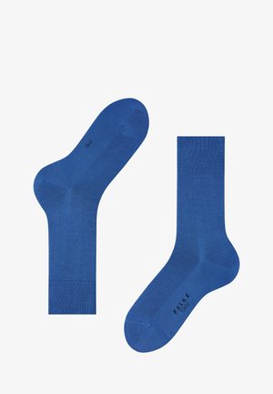 Blaue Baumwollsocken mit einer glatten Textur, verstärktem Fersen- und Zehenbereich sowie einem gerippten Bündchen für zusätzliche Haltbarkeit.
