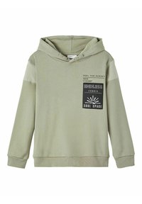Light green hooded sweatshirt with long sleeves. Features a front pocket and graphic text on the chest, complemented by soft fabric and ribbed cuffs.