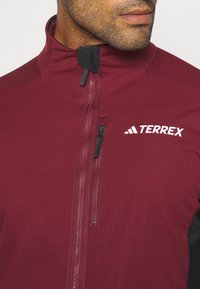 adidas Terrex XPERIOR CROSS-COUNTRY SKI SOFT SHELL - Soft shell jacket - shadow red