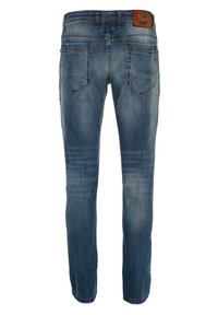 Blauwe denim jeans met een slim fit, achterzakken met gebogen naden en een leren patch in bruin op de tailleband. Vervaagde textuur.