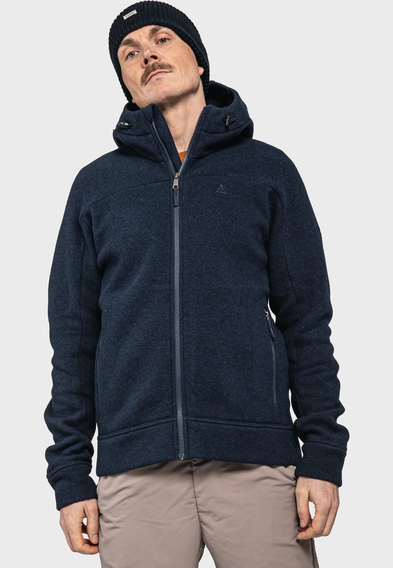 Navy Zip-Hoodie aus strukturiertem Stoff, mit einer verstellbaren Kapuze, Seitentaschen und gerippten Bündchen. Ideal für Freizeitoutfits.