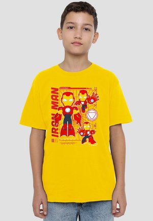 Yellow cotton t-shirt featuring a graphic of Iron Man in red and blue with additional character illustrations and text details. Short sleeves.