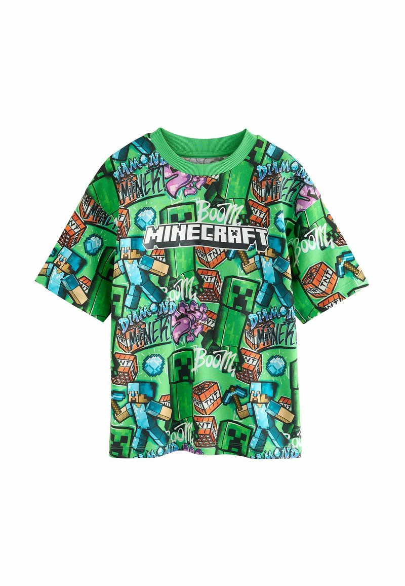 Green short-sleeve t-shirt featuring a Minecraft design with multiple characters, icons, and text in vibrant colors and various patterns.
