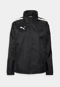 Sort vindjakke med høj krave, lynlås lukning og hvide accentstriber på skuldrene, samt et hvidt Puma-logo på brystet.