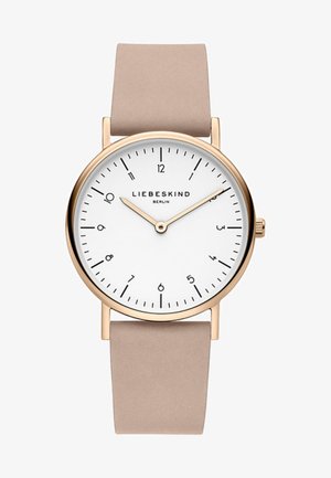 Rund hvid urskive med guld-tone sag, beige læderrem, arabiske tal og minimalistiske timeindikatorer. Mærkenavnet vist.