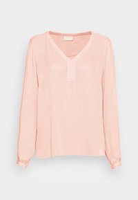 Blusa de manga larga rosa claro con escote en V y una textura sutil. Presenta un corte holgado y puños abotonados para ajustar la longitud de las mangas.