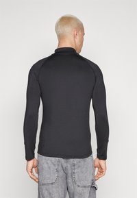 YOURTURN MUSCLE FIT LONG SLEEVE WITH ZIP UNISEX - Hosszú ujjú felső - black