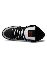 High-top sneakers with black leather and white mesh upper, black laces, red accents, perforated toe, and branded tongue tag.