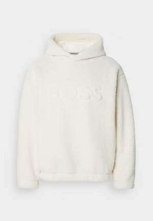 White fleece hoodie with a relaxed fit, featuring "BOSS" logo in matching plush material. Equipped with a wide hood and cuffed sleeves.