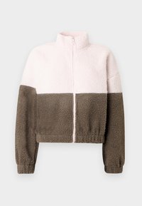 Ζακέτα από φλις με κοντό σχέδιο, με το επάνω μισό σε ανοιχτό ρόζ και το κάτω μισό σε σκούρο καφέ. Διαθέτει ψηλό γιακά και κλείσιμο με φερμουάρ.