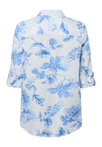 Bloemenoverhemd met een witte basis en blauwe patronen. Voorzien van een kraag en driekwart mouwen met rol-tabjes. Zacht, lichtgewicht stof.