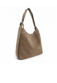 Sac à épaule en daim marron avec une texture douce, une forme incurvée et deux fines poignées. Il présente un design minimaliste et des lignes épurées.