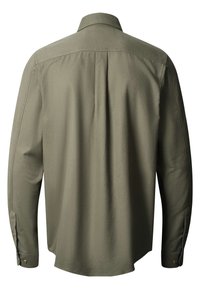 Olīvzaļš garu piedurkņu krekls ar pogājamo apkakli, gluda tekstūra un taisna mala. Iezīmējas ar pogu akcentiem uz piedurknēm.