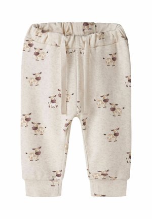 Pantalon beige pour bébé avec taille élastique et cordon, avec un motif ludique de vache partout.