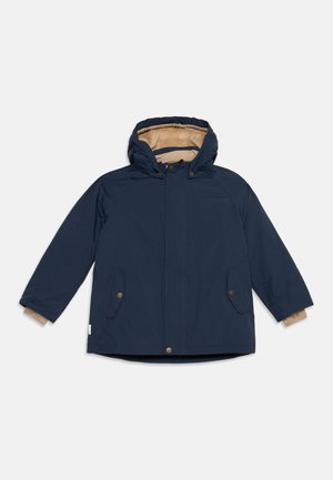 Navy blue hooded winter jacket with tan fleece lining, front pockets with button flaps, and button and zipper closure.