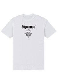 Bílý bavlněný tričko s nápisem "The Sopranos" v černém písmu, pod nímž se nachází dekorativní grafika kříže a koruny.