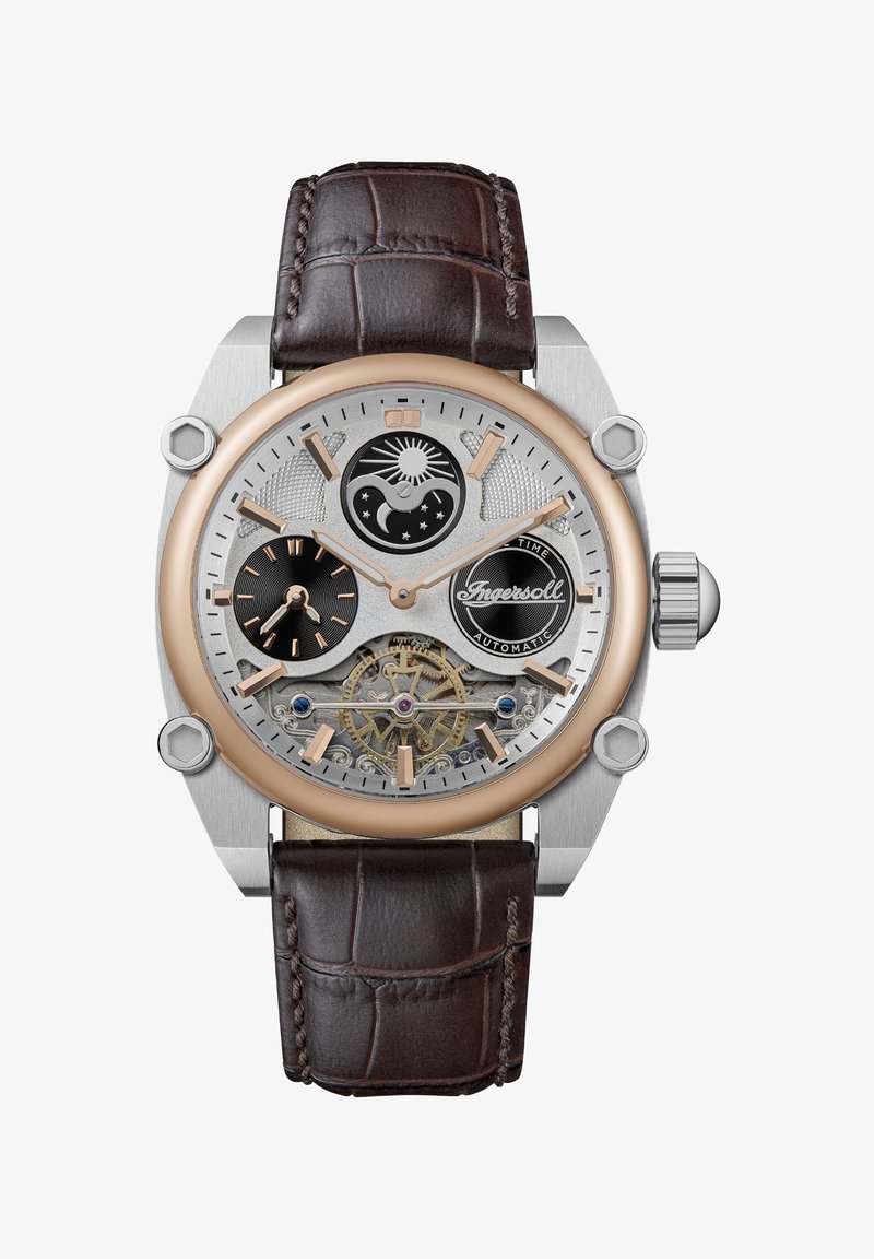 Zilveren roestvrijstalen horloge met een roségouden bezel en een bruine krokodillenleren band. Bevat twee sub-dials, ingewikkelde tandwielen en een gestileerd wijzerplaat.