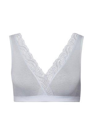 Valkoinen bralette, jossa on syvä V-pääntie, ja reunassa on pitsireunus. Valmistettu pehmeästä, joustavasta kankaasta mukavuutta varten.