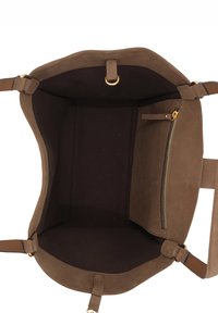 Brown suede tote bag with a spacious interior, featuring a dark fabric lining and a zippered pocket on one side. Gold-tone hardware accents.